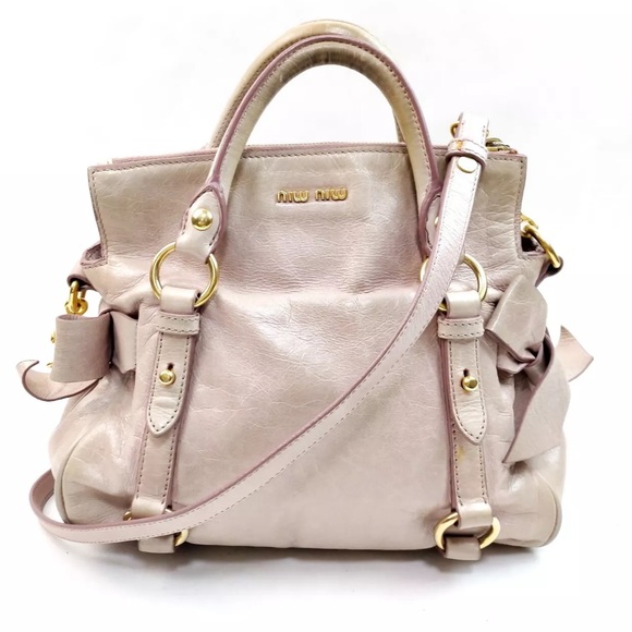 Miu Miu Handbags - Miu Miu Vitello Lux Bow Satchel,
pink leather. Good condition. Authentic